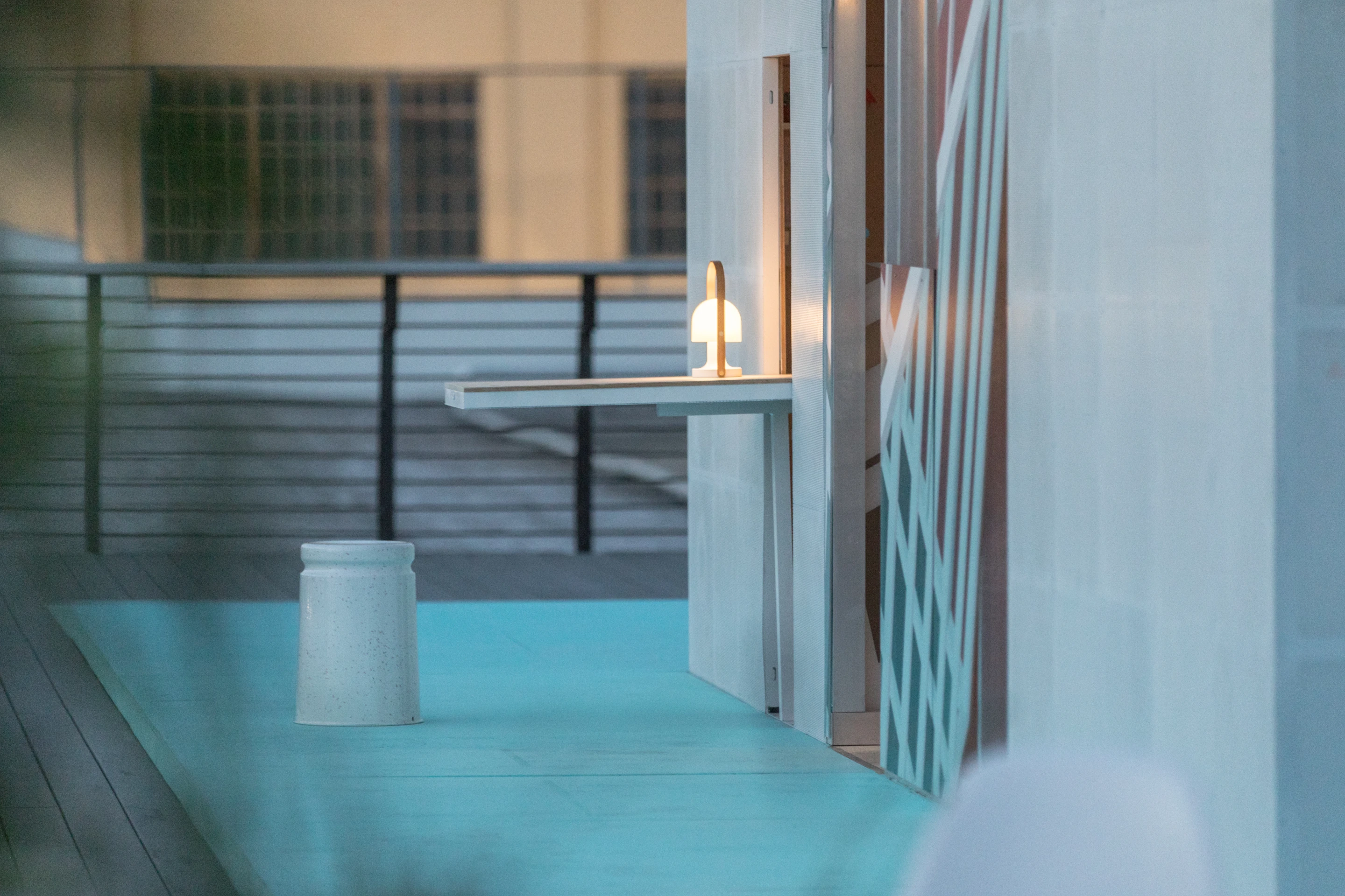 Space-saving mechanisms like folding dining tables and shelves and rotating panels feature throughout Mini's urban cabin concept in LA