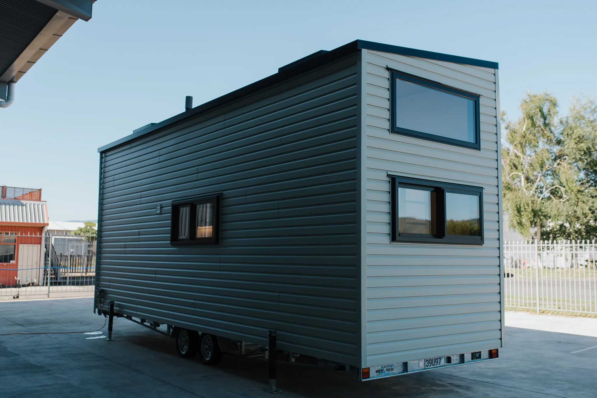The Tiny Tāwharau is finished in vinyl cladding