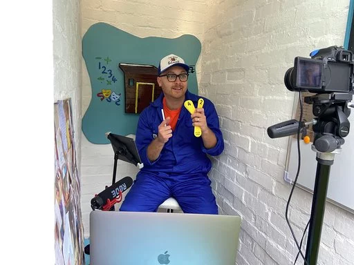Shed School, by teacher Ashley Bates, has been turned into an online platform from which children can learn each day for free. Each day he dresses up as a pirate and teaches subjects like Math and English. The project is a finalist in the Lockdown - Repurpose category