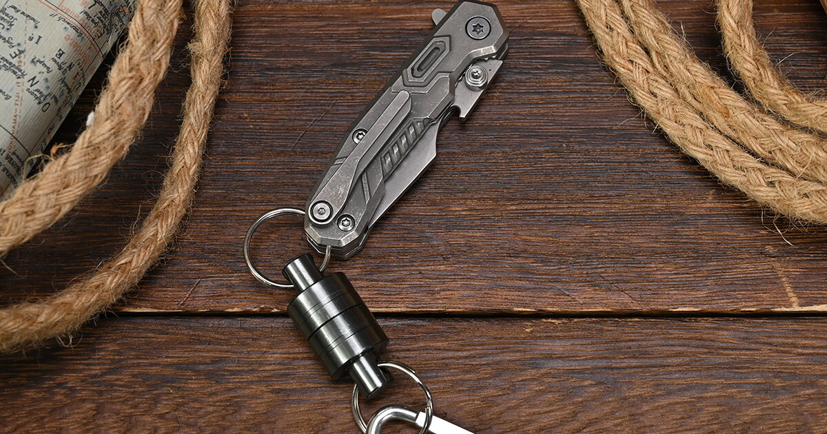 Titanium pocket knife with M390 steel puts serious cutting power on your ...