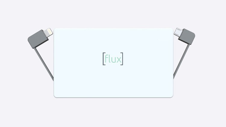 The Flux Portable Charger is a thin device that can slip into a pocket to quickly top up a phone
