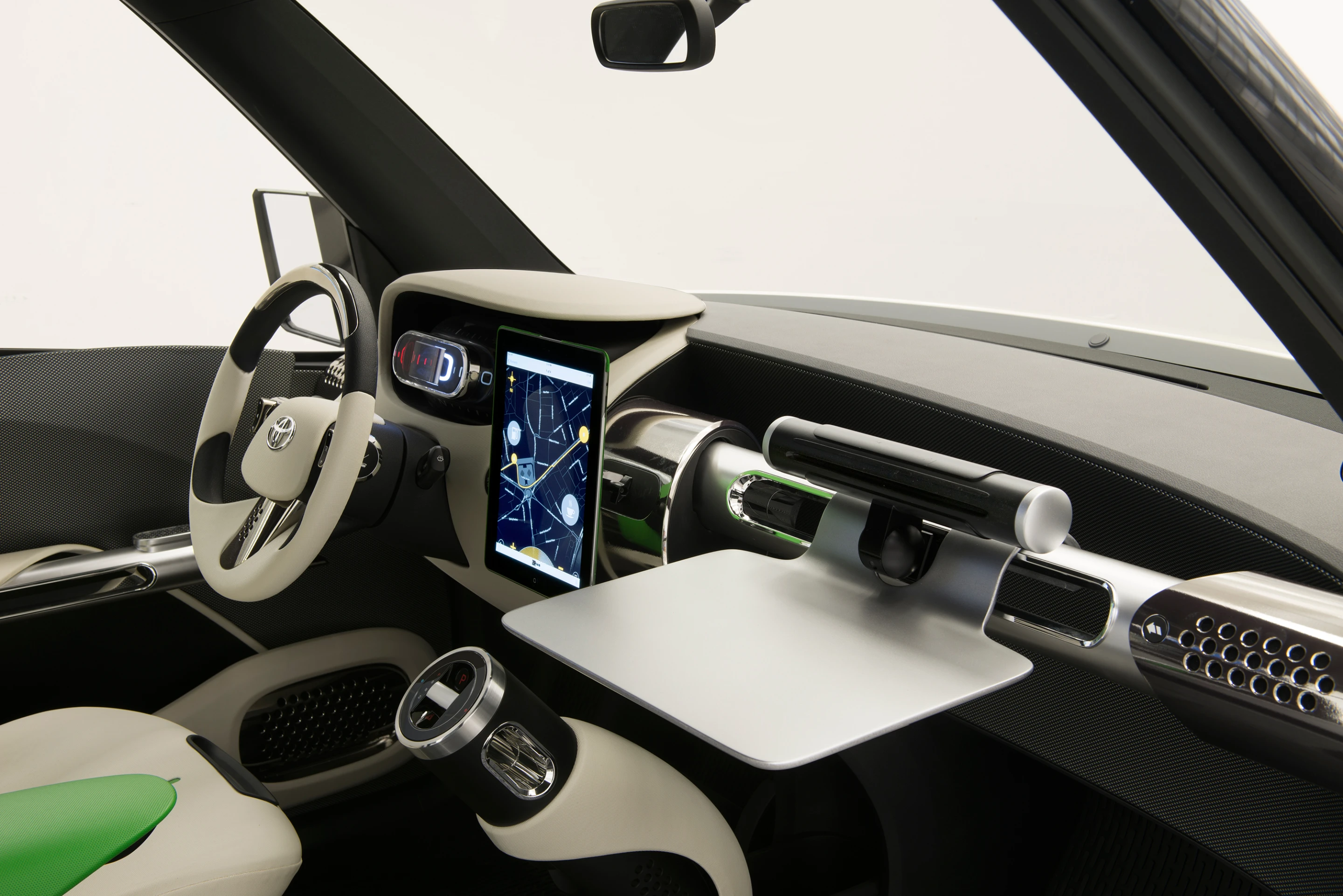 A retractable utility bar on the passenger side has the flexibility to support a desk, laptop or grocery bag hooks