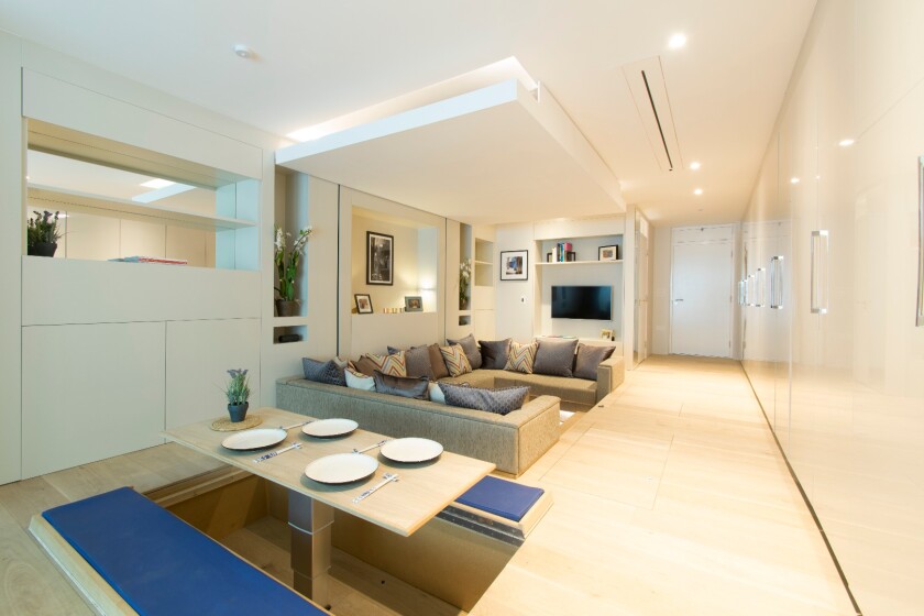 Yo! Home apartments feature a kitchen table and benches that are hidden underneath the floor when not in use