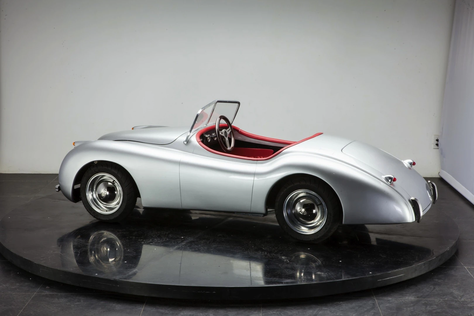 The ex-factory retail prices for the XK120 is £7,999, US$12,399 or €11,299 depending on the customer 's preferred currency, with shipping costs on top of that