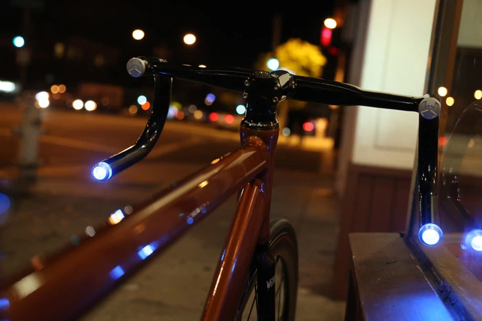 When activated by one of two switches located on either side of the stem, either of the RGB LEDs can be made to blink on and off for five seconds, serving as a turn signals