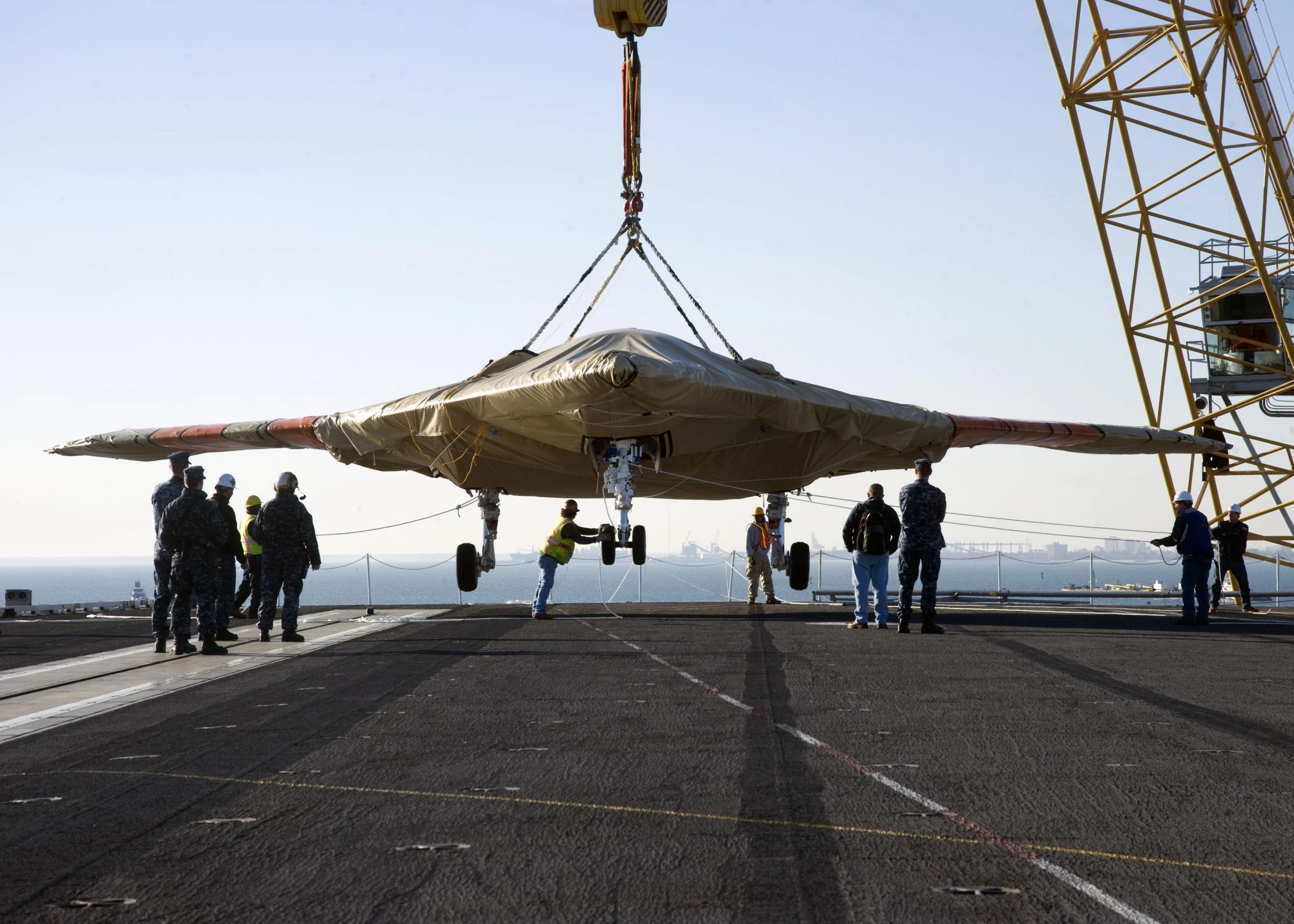 The X-47B UCAS arrives onboard the USS Truman, the first modern aircraft carrier to host test operations for an unmanned aircraft (Photo: U.S. Navy MC3 Lorenzo J. Burleson)