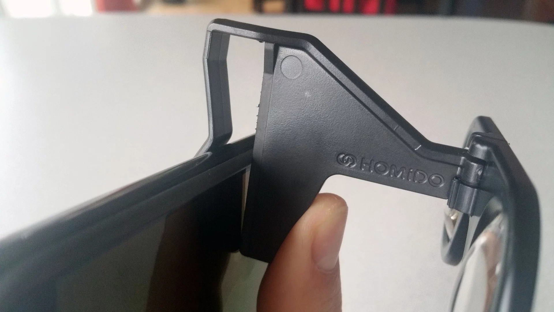 The Homido Mini clips to smartphones, though too much friction starts to wear the rubber