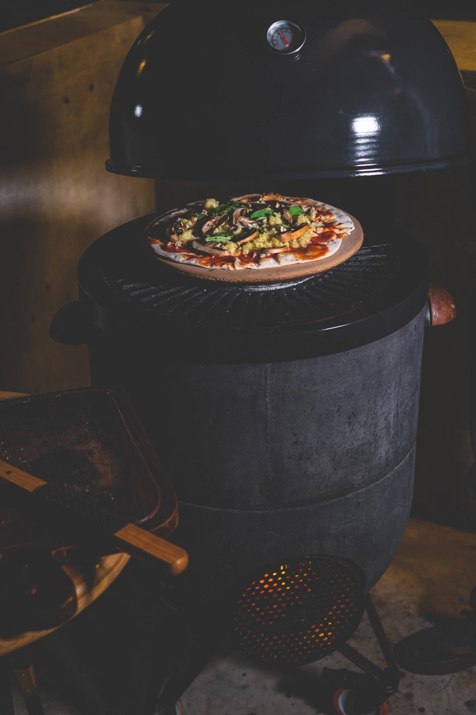 Pizzas can be prepared using a refractory disk