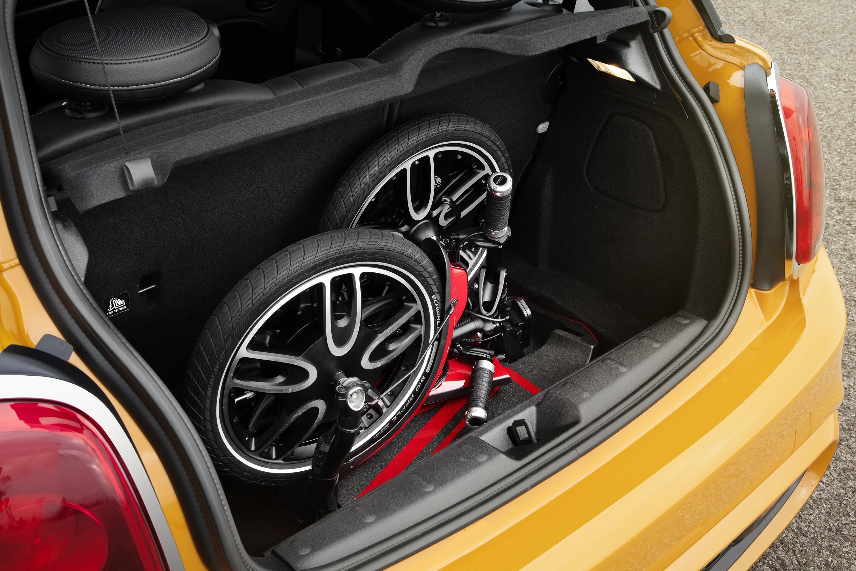 BMW says that the Mini CitySurfer concept would be compact enough when folded up to be carried on buses and trains or thrown in the back of the car