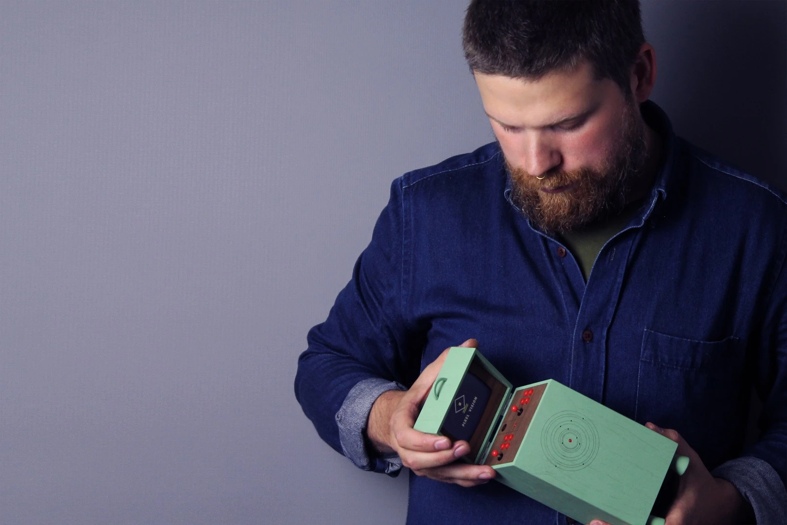 This mini replica of a larger arcade cabinet is fully functional
