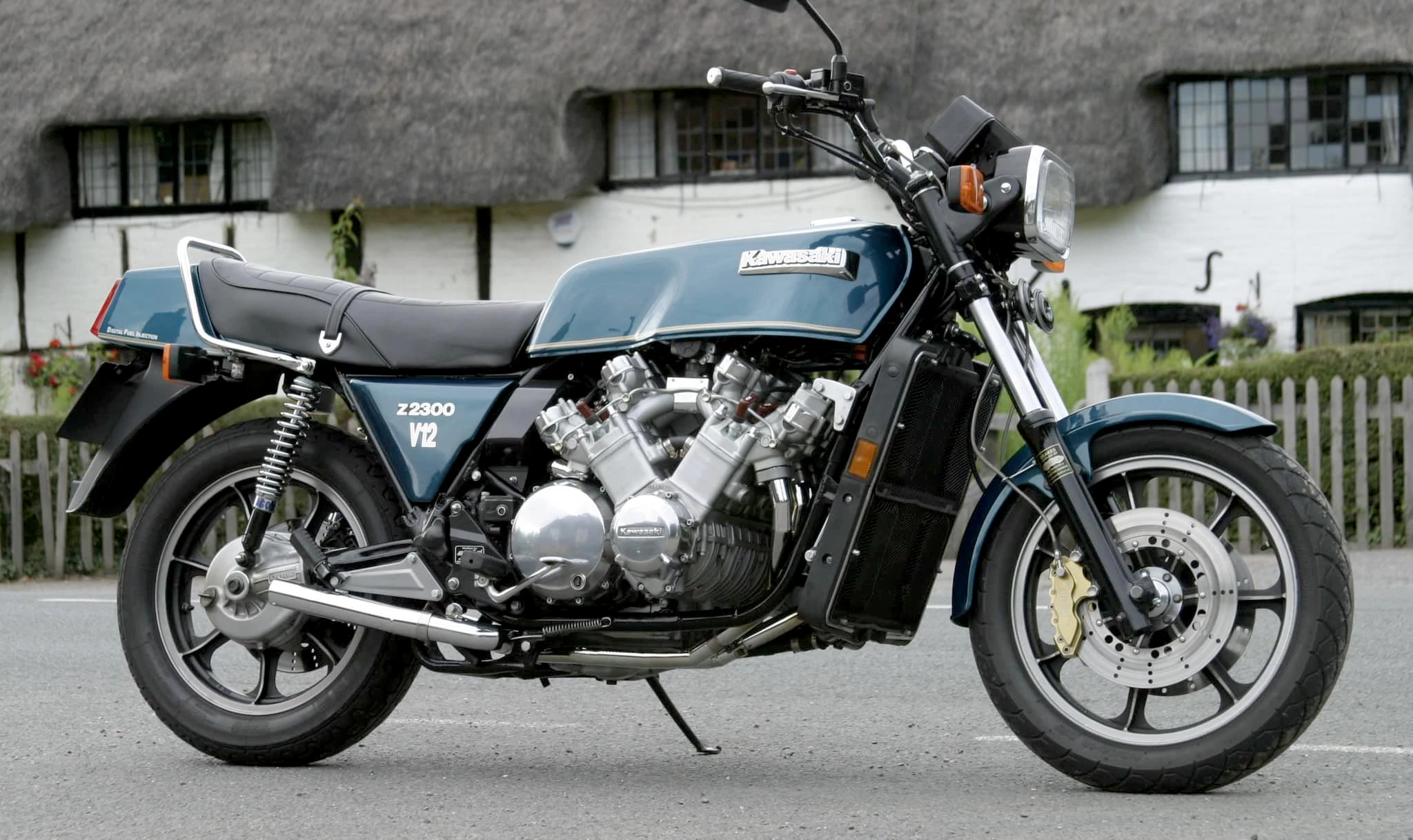 Allen Millyard was just 11 years-of-age when he began his non-traditional engineering journey by shoehorning a Morris MINI 850cc four cylinder car engine into a BSA Bantam frame. Things got weird(er) from there. This is his 2300cc V12 Kawasaki, built by combining the engines of two six-cylinder Z1300s