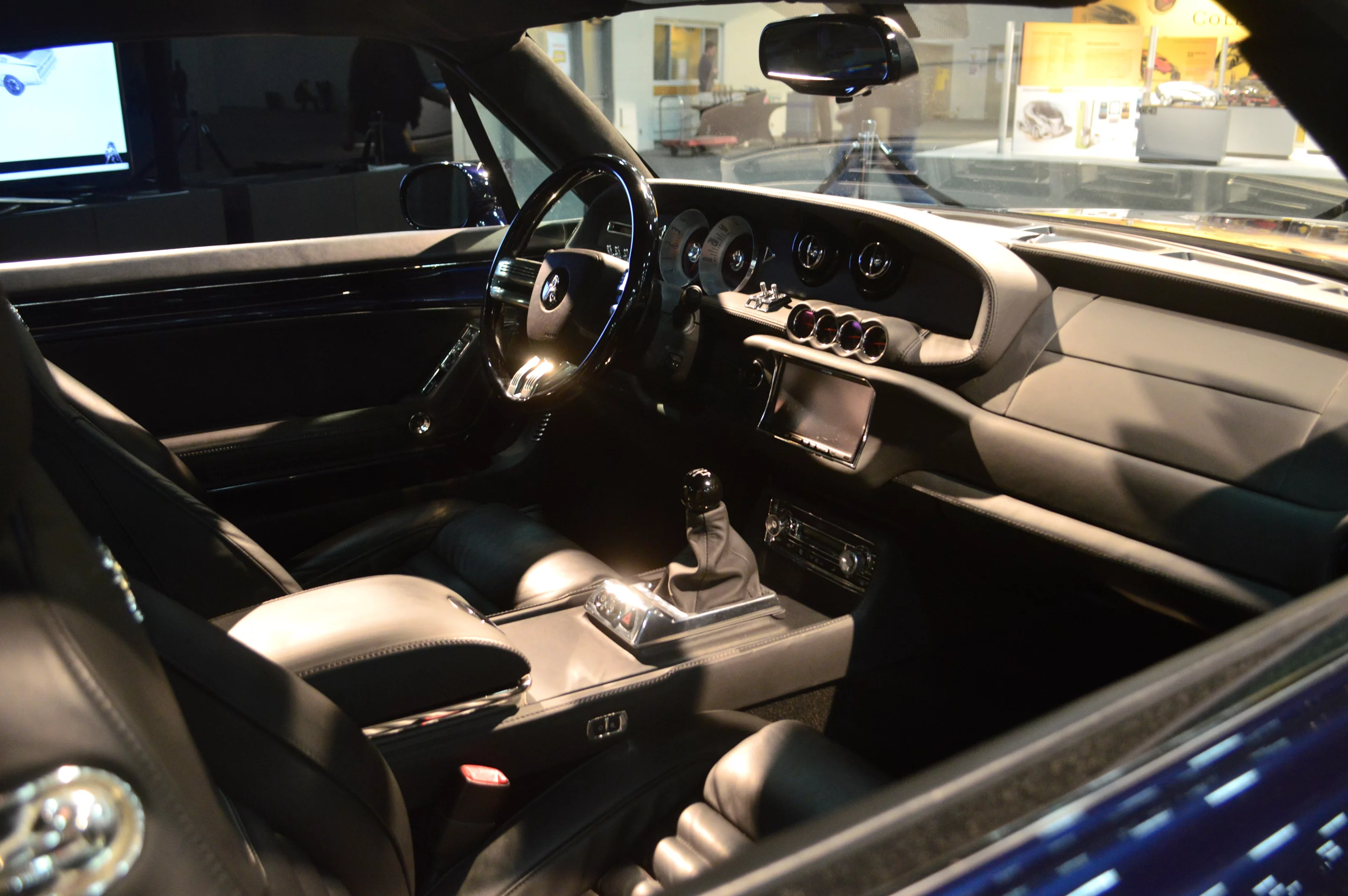 The exterior is retro muscle, but the interior is up-to-date style and tech