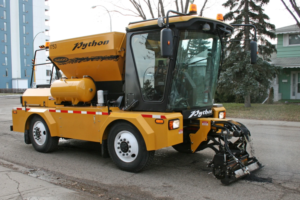 The Python 5000's single operator can quickly fill potholes from within the vehicle's cab