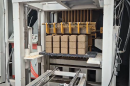 The mobile brick factory neatly stacks the bricks as it pops them out