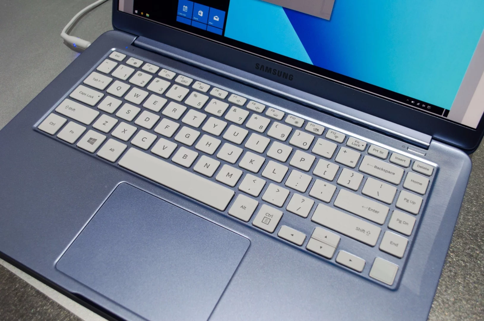 Blue variant of the Notebook 9, with a white keyboard