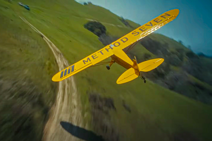 A Piper J3 Cub low-level flying, piloted by Eric Tucker