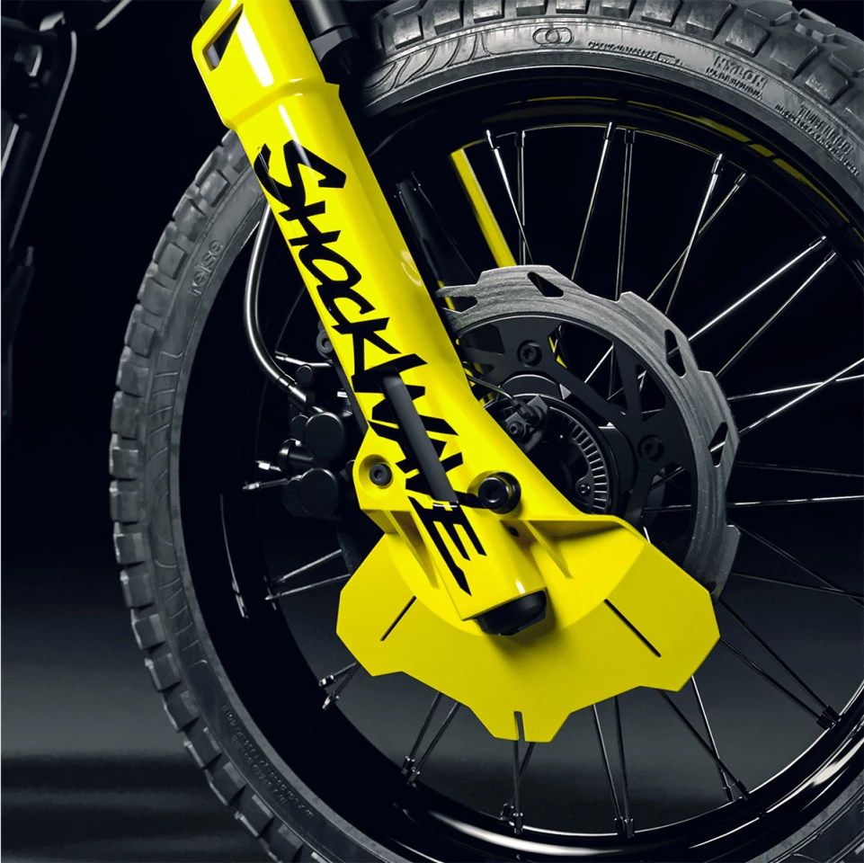 The Shockwave gets a larger 19-inch spoked wheel and cartridge forks in front, and a smaller 17-incher with a monoshock at the rear