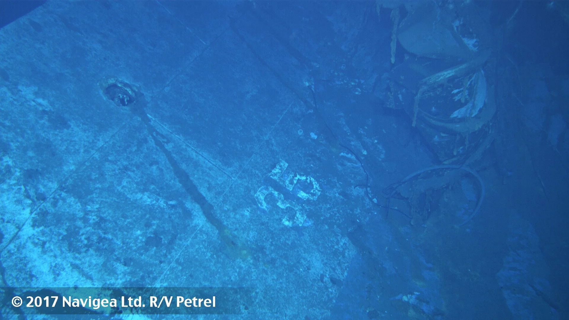 An image shot from a remotely operated vehicle shows what appears to be the painted hull number "35"