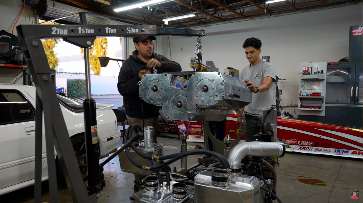 The Y12 block on a hoist before being Frankenstein'd with the rest of the bits that make it go "vroom"