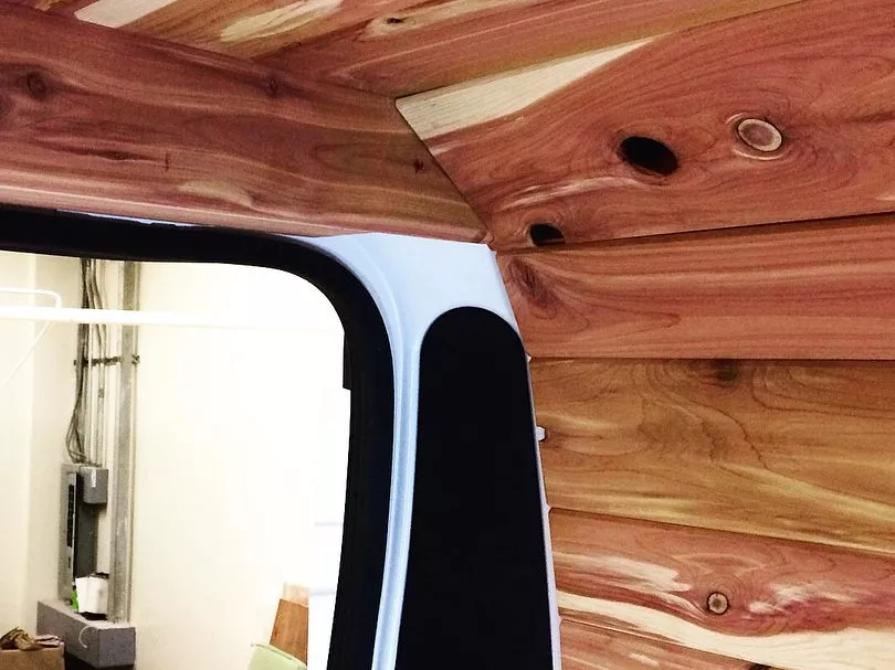 The wood paneling on the walls is one of the things that makes this conversion uniquely Off Grid