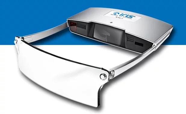 Iris consists of a 720p laser projection unit which is joined by a pair of arms to a flip-down transparent screen