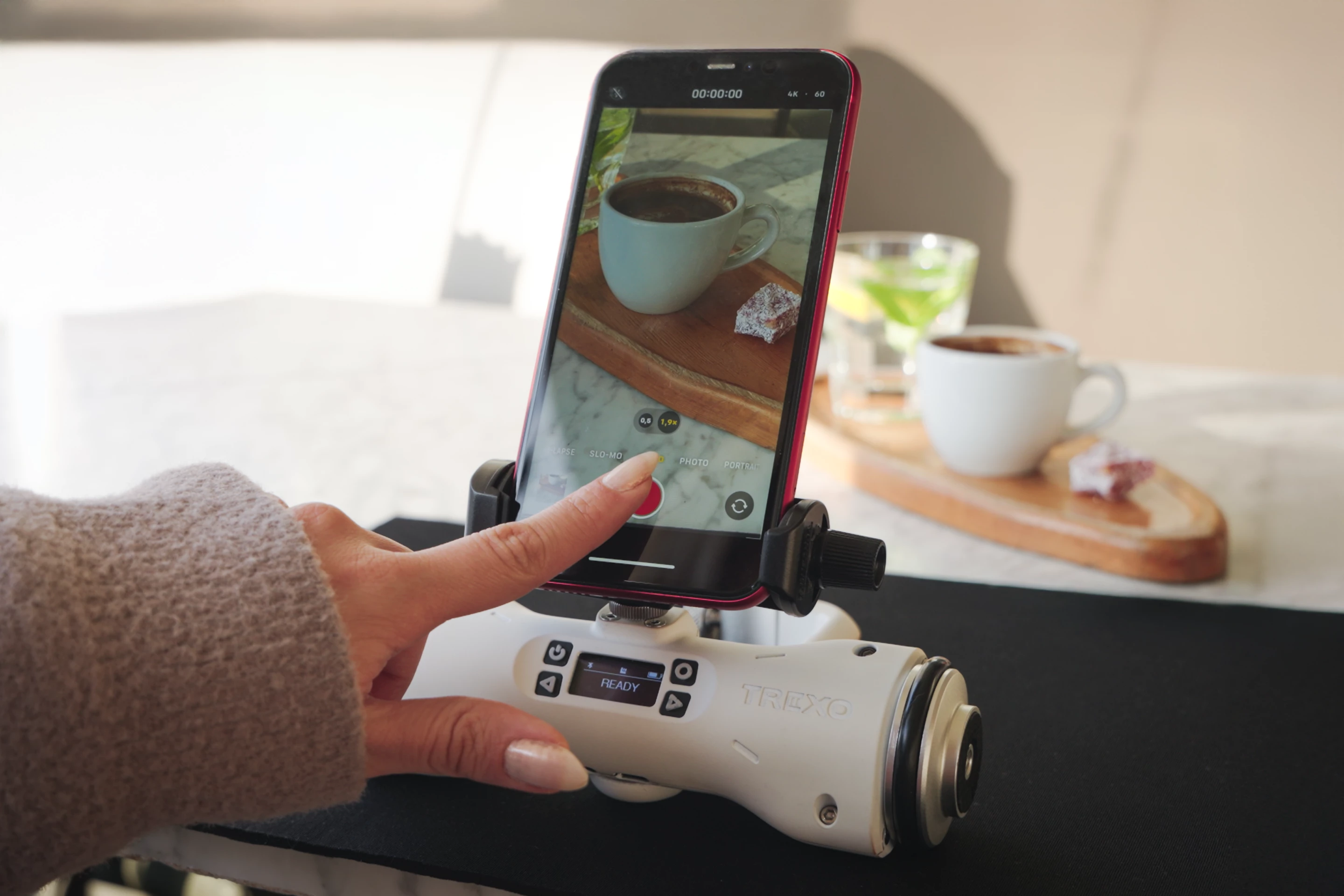 The Trexo Wheels Go in dolly mode, ready to push in with a phone-mounted camera
