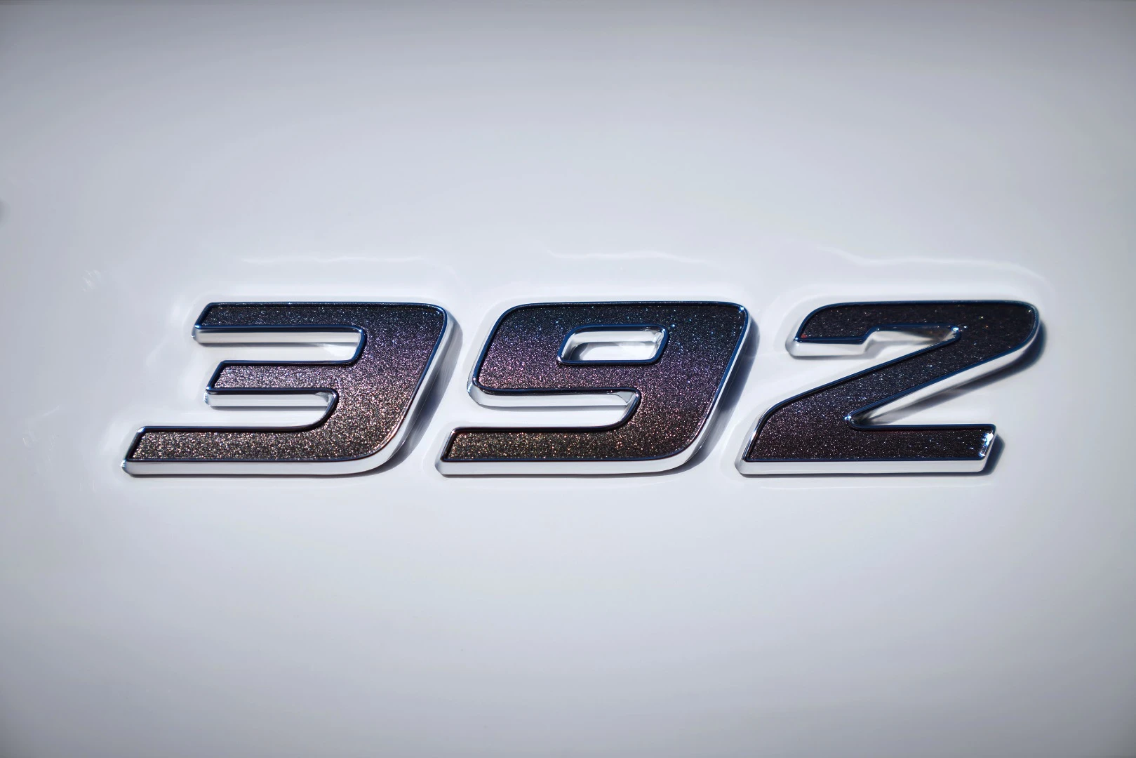 The "392" badges reference the 392-cu in engine