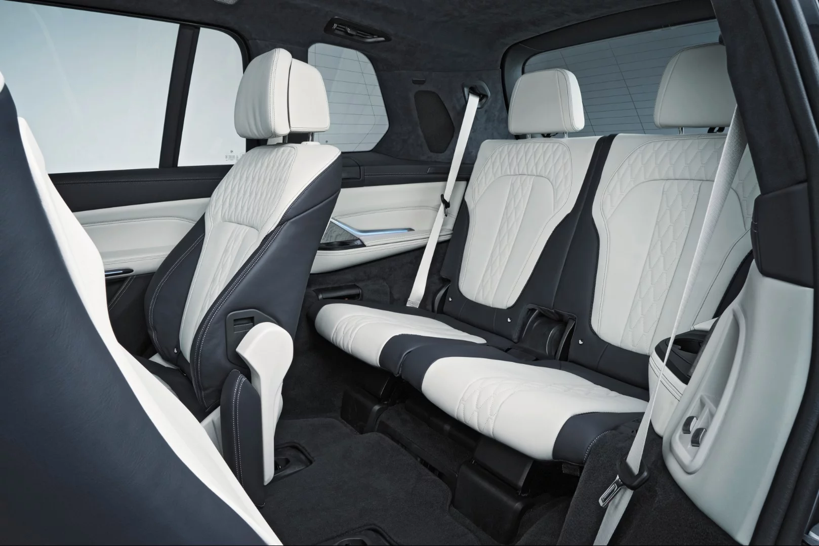 Fold forward the middle row and you've got access to a very comfy back row of two seats