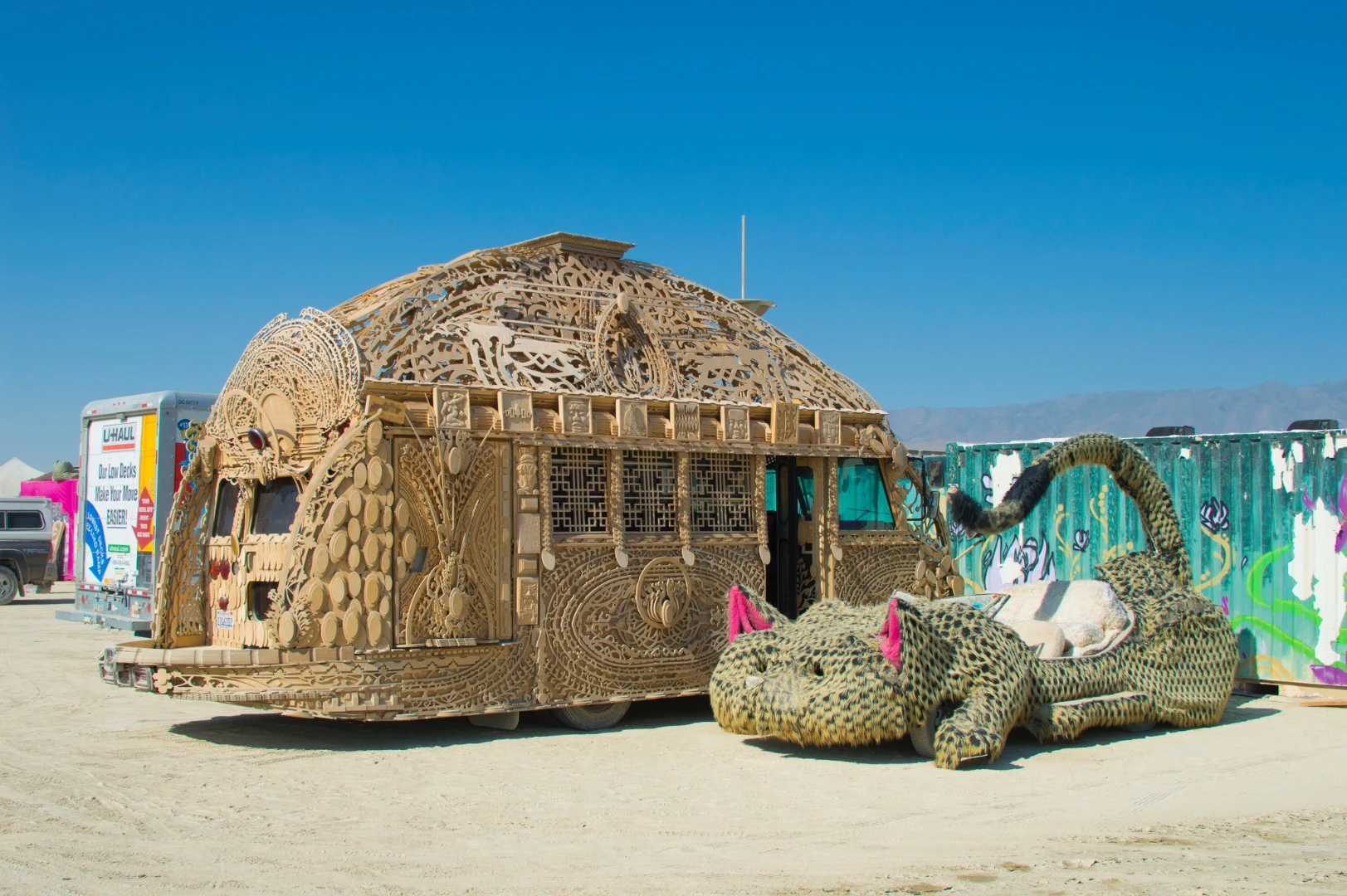 This art car is covered with intricate hand carved wood work