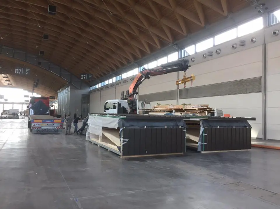 Two M.A.Di modules get ready to be packed for transportation via truck