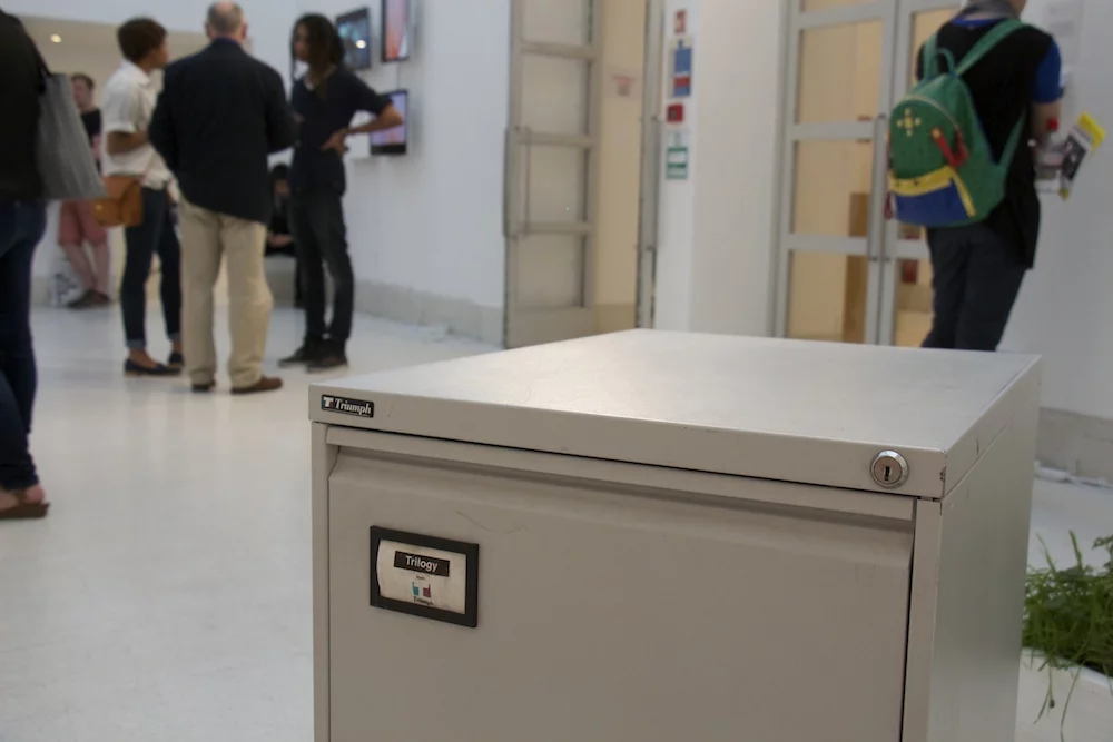 The autonomous filing cabinet contains part of an electric wheelchair, an Arduino board, and assorted sensors (Photo: Jaap de Maat)