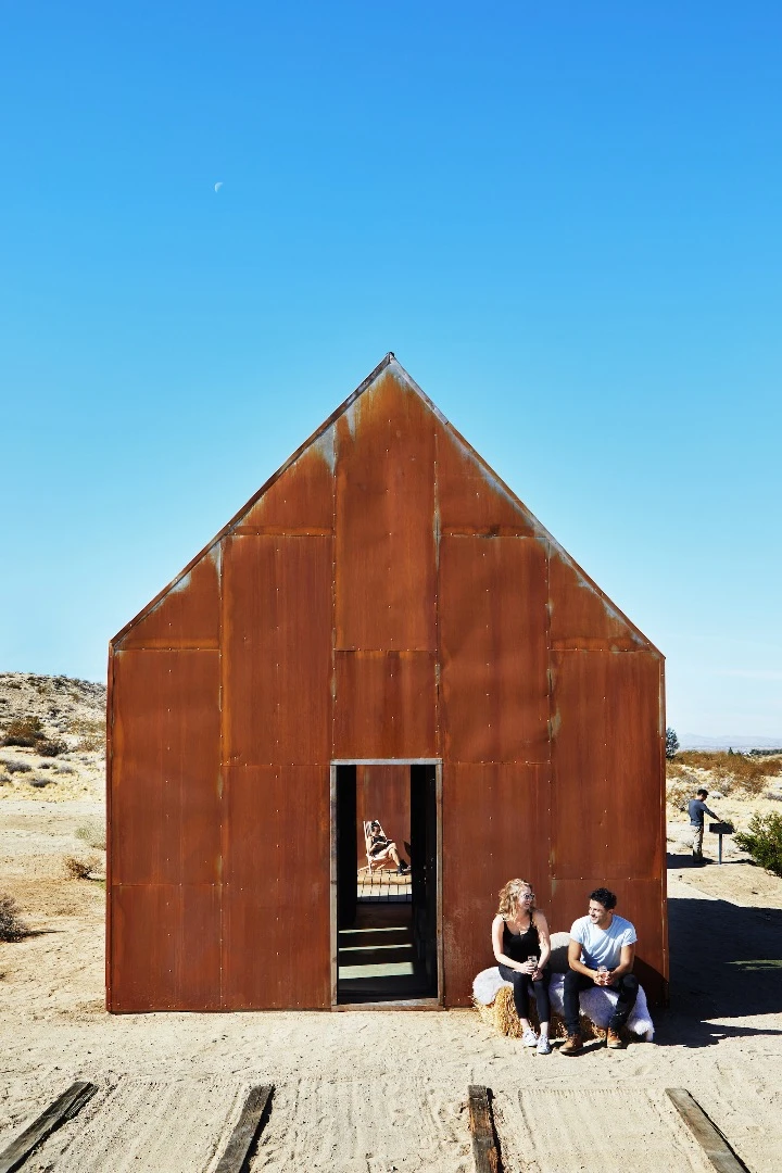 The Folly takes its place well among the rugged desert landscape of Joshua Tree, California