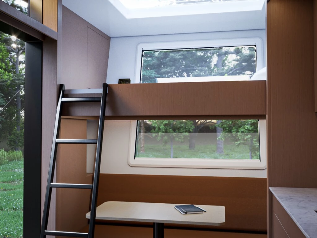 When lowered into sleeping position, the upper bunk bed opens a view of the skylight above
