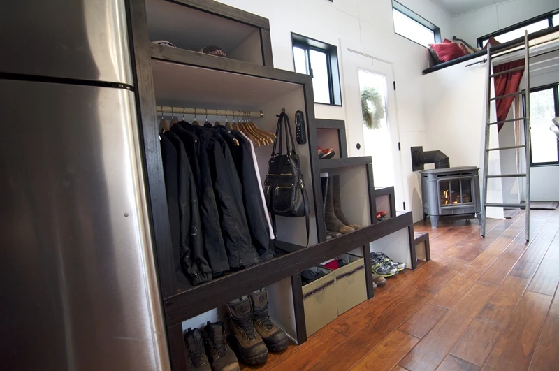 The staircase doubles as a space for storage