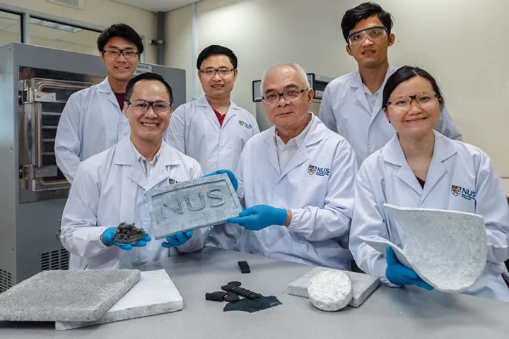 The research team, with samples of the aerogel – lead scientists Duong Hai-Minh (left) and Nhan Phan-Thien are holding the NUS mat