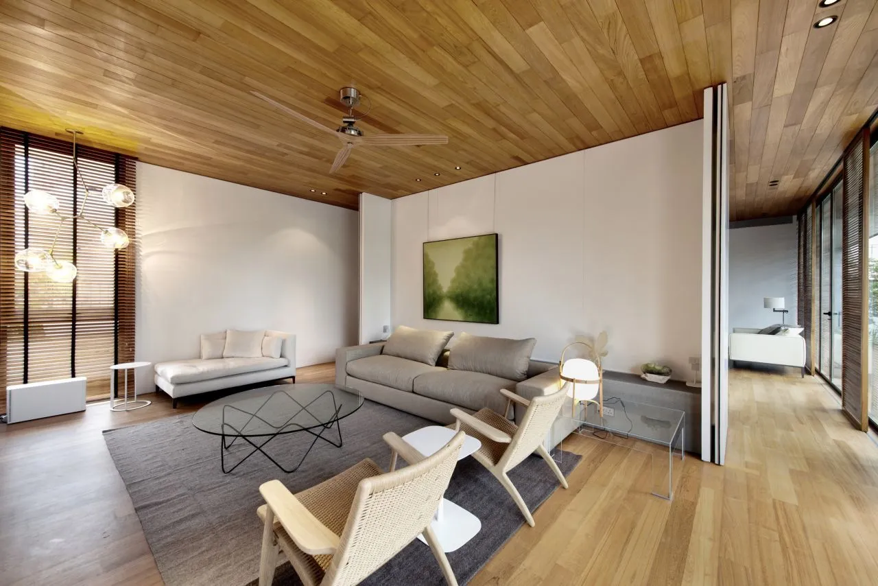 The slightly smaller upper floor has just one bedroom, but also features a study, gym, and water feature Photo: Bryan van der Beek and Edward Hendricks)