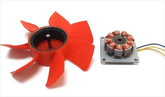 The Orange Power Pump - the kinetic energy drives a small turbine