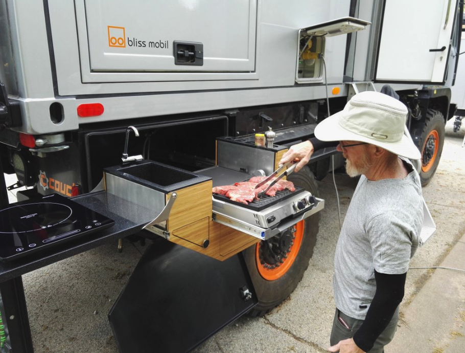 The Bliss outdoor kitchen folds out to create a spacious cook-out