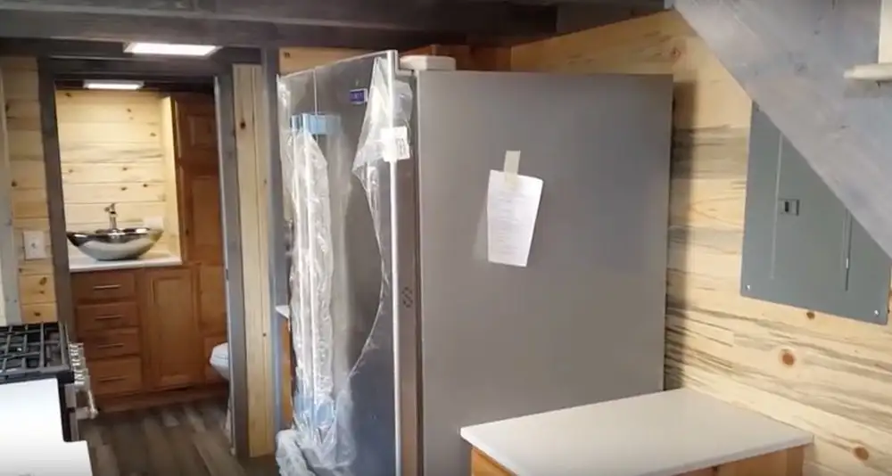 The Tiny Giant's kitchen includes full-size appliances