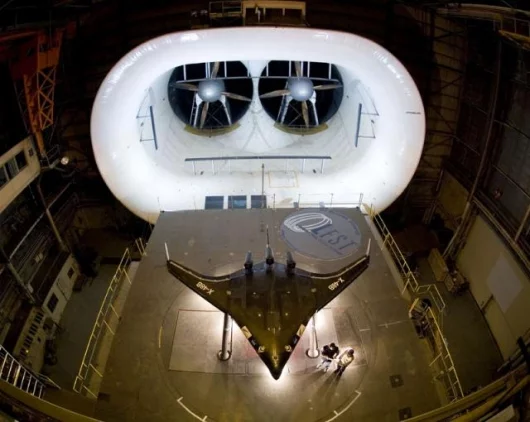 Boeing's Blended-Wing Body (BWB) X-48B prototype in wind-tunnel testing. Photo courtesy of Boeing.