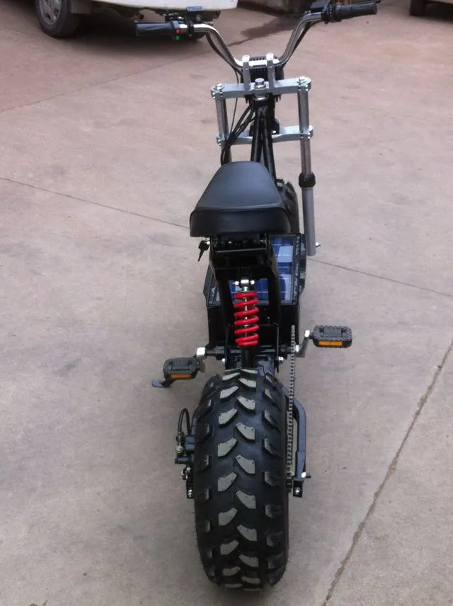 The alloy frame sits atop two 19.7-inch off-road tires, measuring 3.75 ft (1.1 m) from end to end