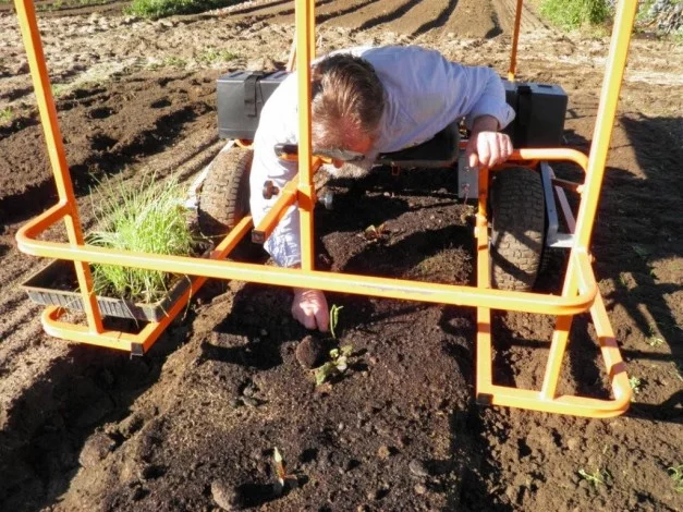 Inventor Brendan Corry demonstrating his Wunda Weeder