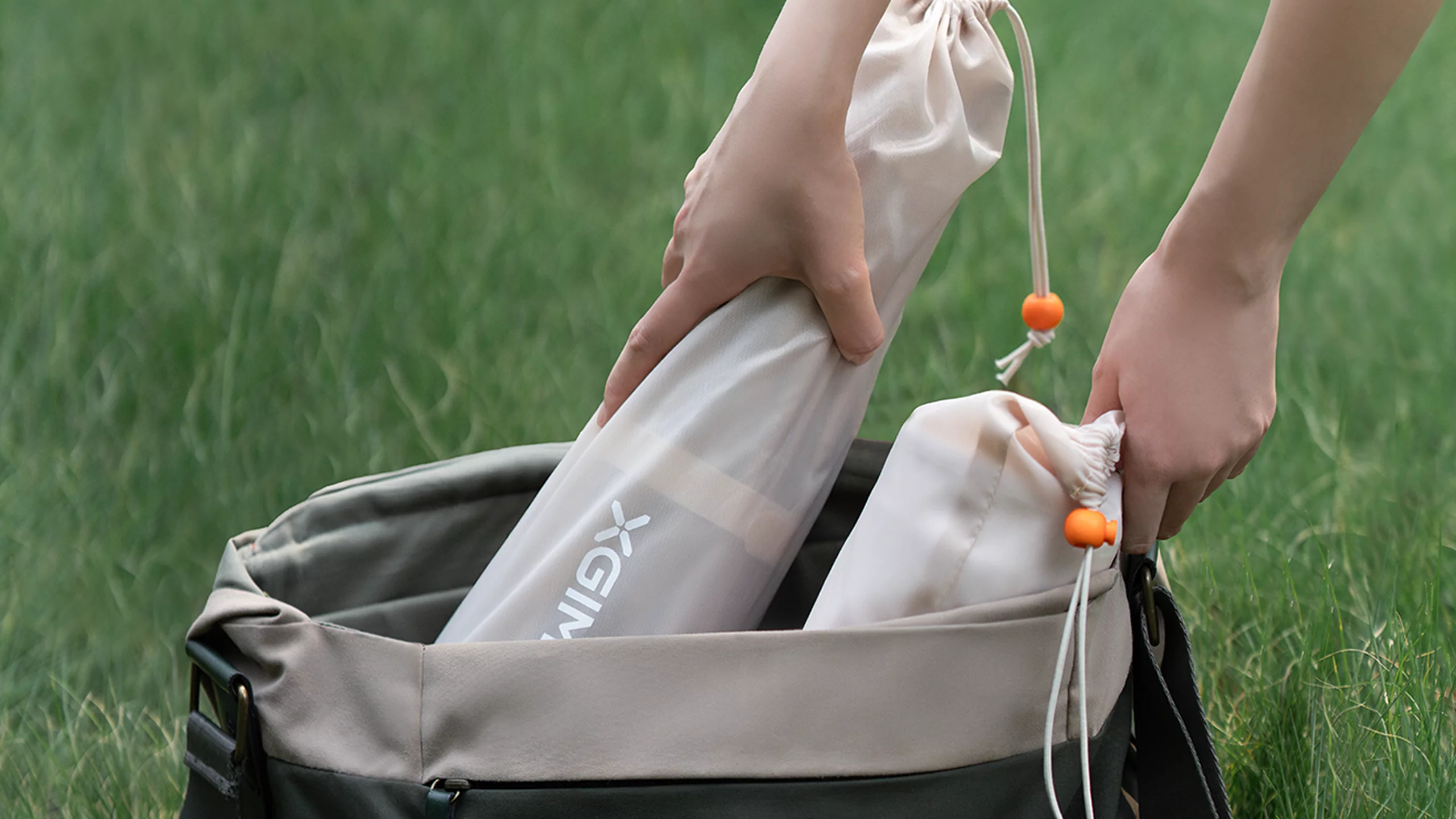 XGIMI's Portable Outdoor Screen packs down for between-show transport