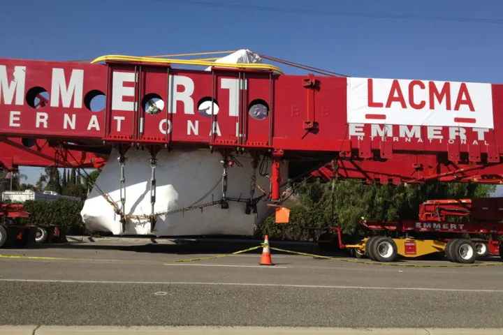 A specially-designed truck is carrying the massive 340-ton rock to Los Angeles at 8mph