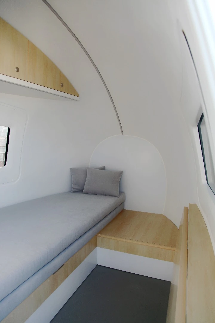 The Ecocapsule gets power either from a standard grid hookup or can run off-the-grid with a 880 W solar panel array and a 750 W wind turbine mounted on a telescopic pole