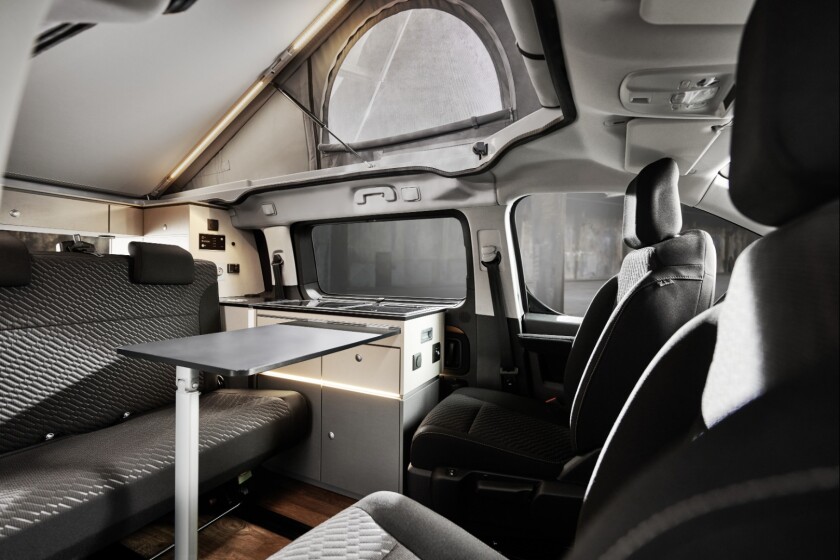Connect the table to the kitchenette and you have an indoor dining room