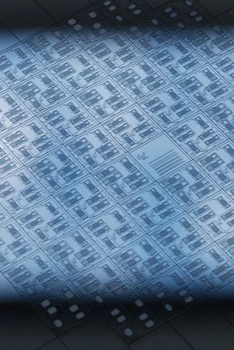 A wafer with a number of chips on it, each chip contains six tiny mass-spring systems and each system produces a different tone