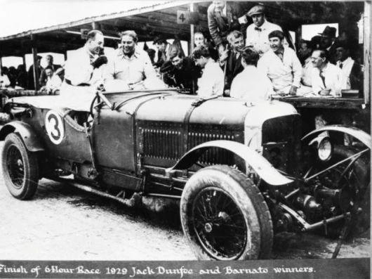After winning a six hour race in 1929 - Jack Dunfee at left and Woolf Barnato at right