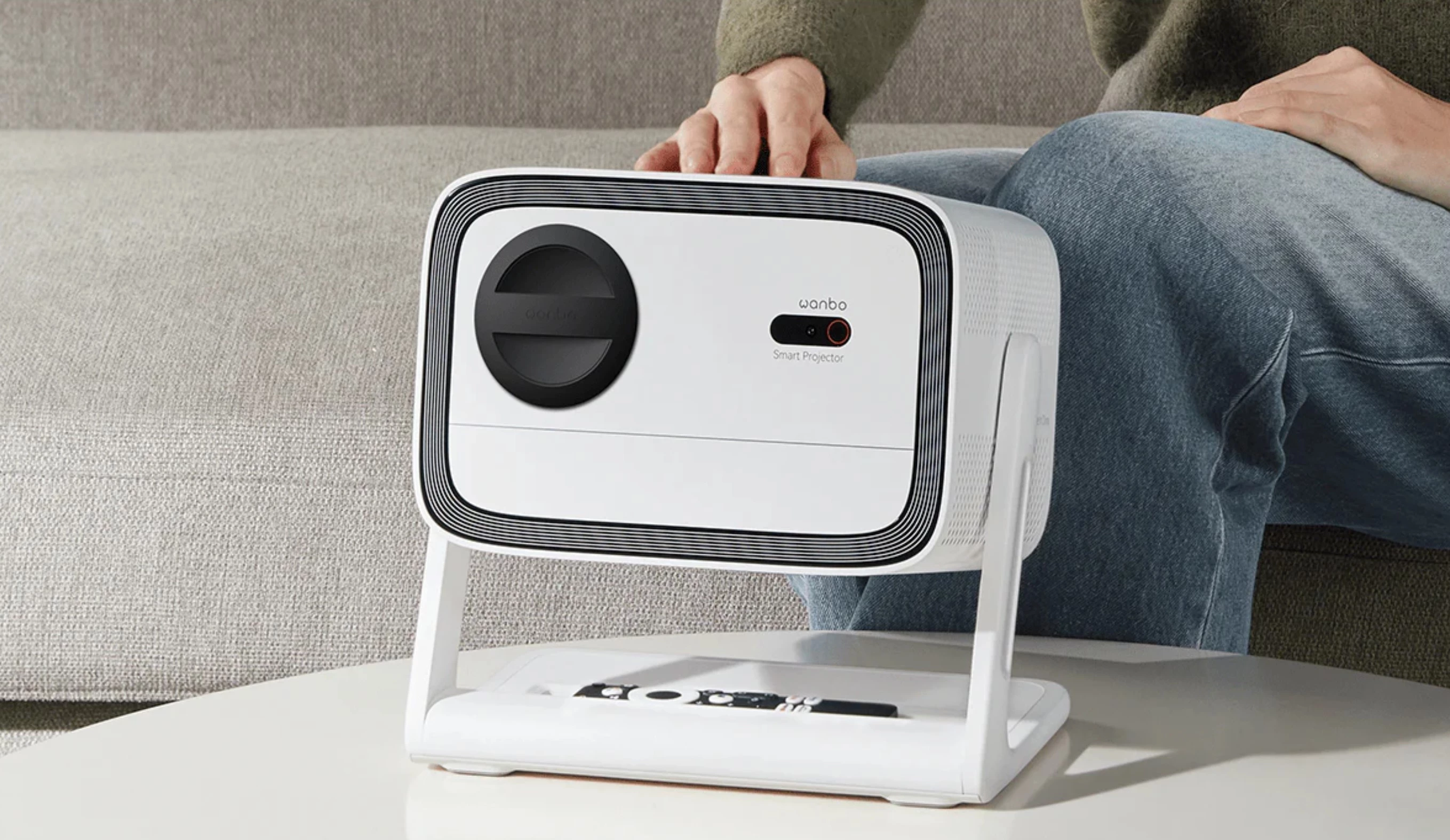 The gimbal stand features a space to stow the remote