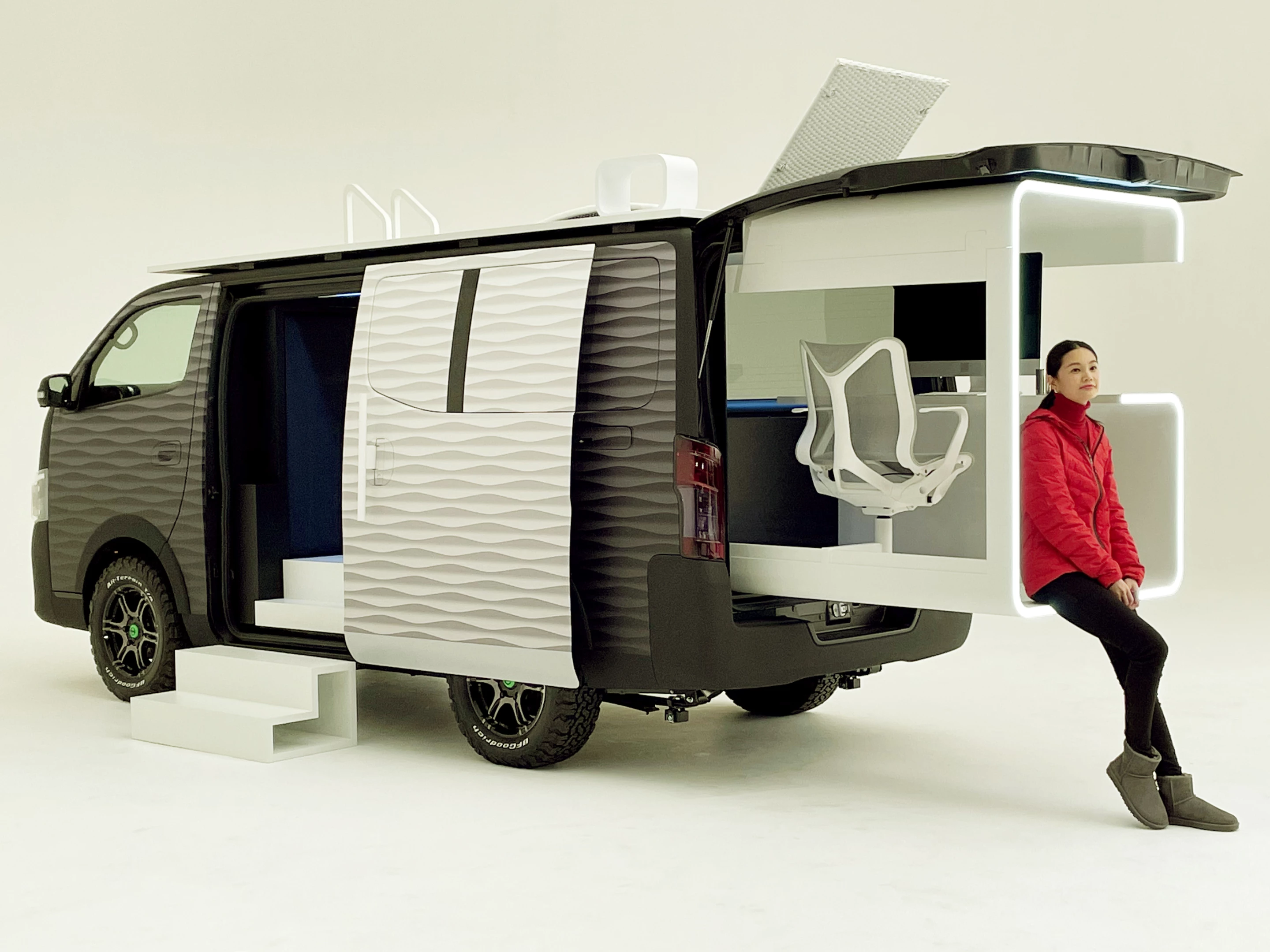 Nissan gives the base van a more rugged look with unique body paneling and fender flares